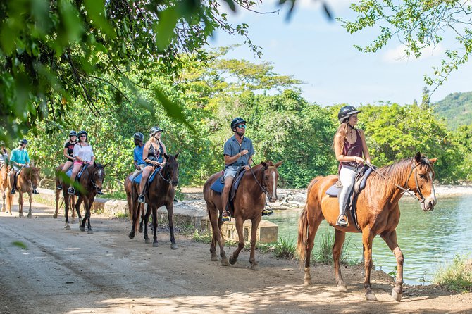 Bamboo Rafting, Horseback Riding & Blue Hole Waterfall Tour